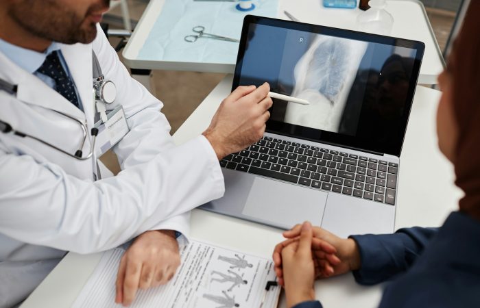 Physician Explaining X-ray Result to Patient